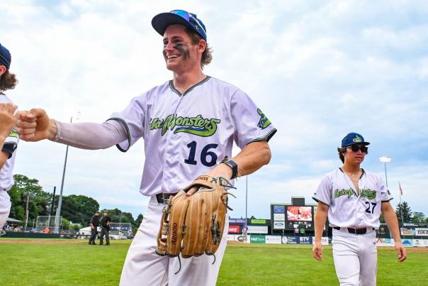 Vermont Lake Monsters playing shaking hands with teammate