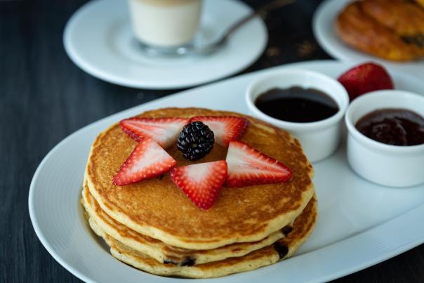 Stack of pancakes with fruit