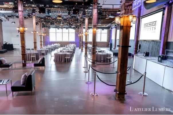 Steam Whistle Brewing's event space set up with tables and chairs