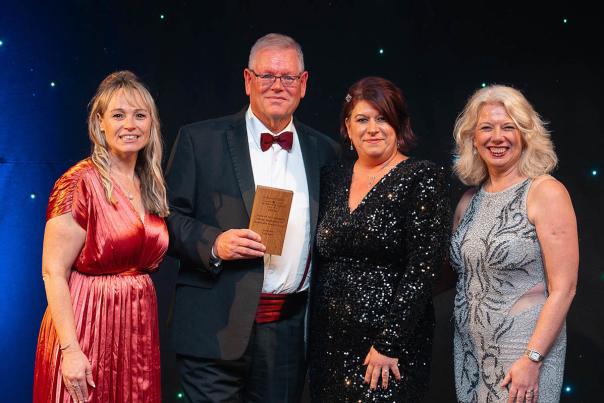 Managing Director Simon Green and Operations Manager Michaela Rozborilova of Stubcroft Farm receiving one of their three Gold awards with Fran Downton CEO of Tourism South East and Deidre Wells OBE.