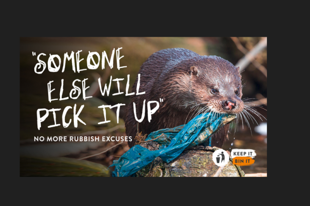 The image shows an otter with rubbish from the river in its mouth. The caption reads "Someone else will pick it up" indicating that if we drop litter it can affect the health of our wildlife.