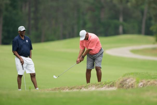 Two men playing golf at the Ryder Golf Course in Cumberland County, NC