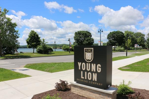 Young Lion Brewing Exterior sign overlooking lake front