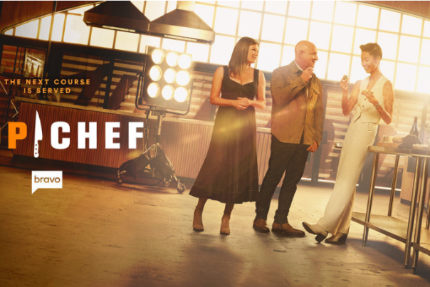 A photo of Top Chef judges leaning against a table with the words Bravo Top Chef on top of the image