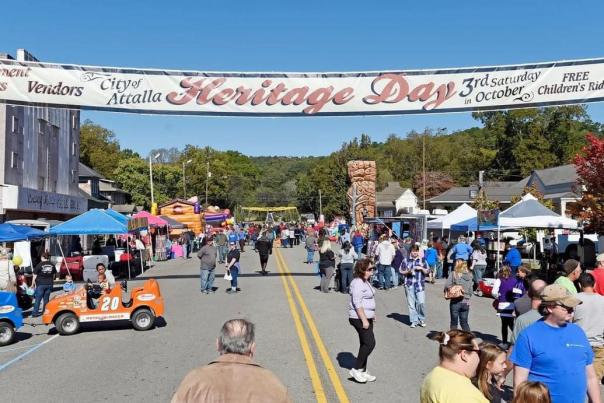 People and arts and craft booths fill the streets of downtown Attalla during annual Heritage Day