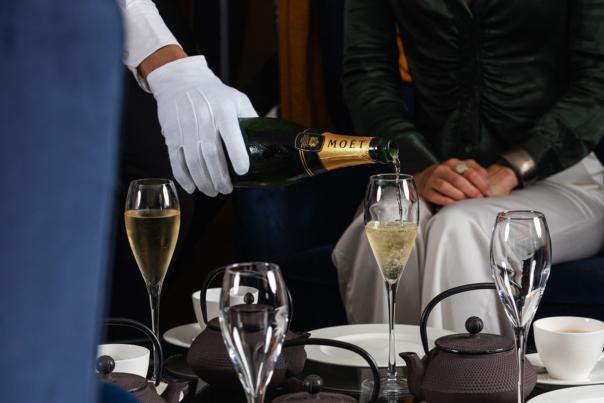 Champagne being poured in to a glass