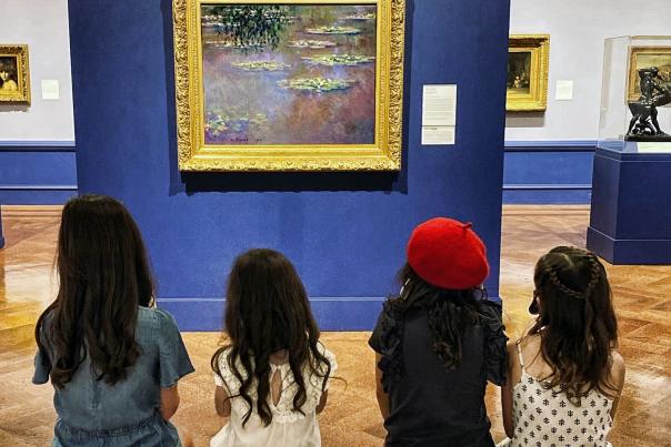 Dayton Art Institute visitors viewing Monet's Waterlilies painting