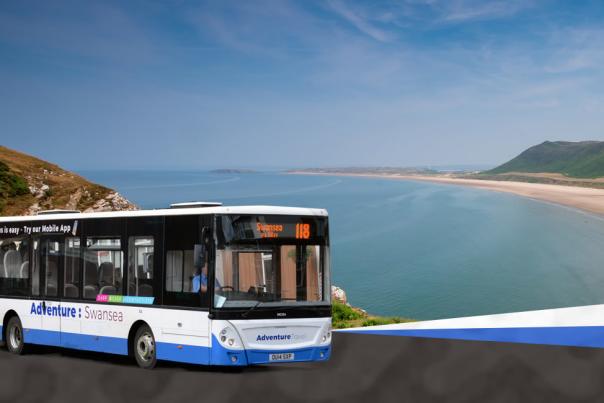 A picture of a bus with a Gower beach in the background.