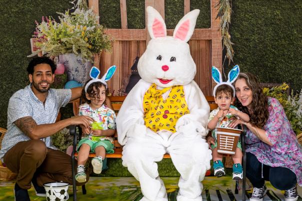 Family posing with Easter Bunny