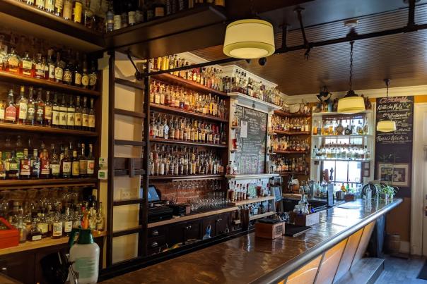 More than 700 bottles of bourbon behind the bar at Old Kentucky Bourbon Bar