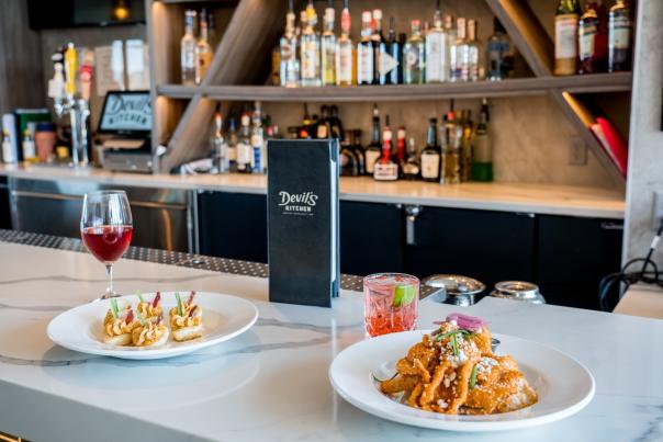 Two Plates of Food at the Bar at Devil's Kitchen