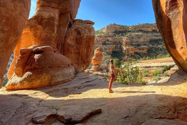 Woman hiking on Devil's Kitchen Trail in Colorado National Monument