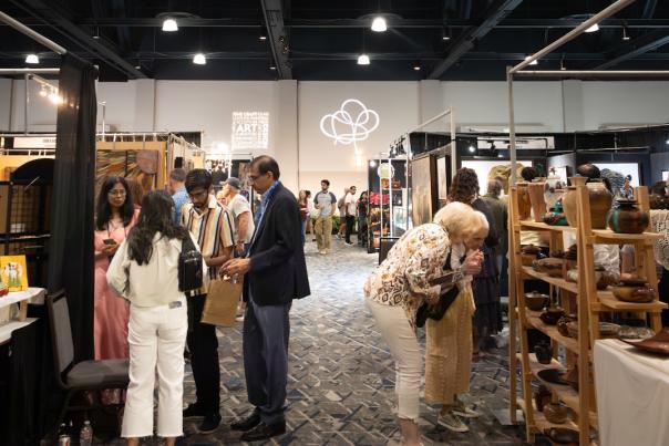 Guests explore The Woodlands Fine Craft, Art & Design Show at The Woodlands Waterway Marriott.