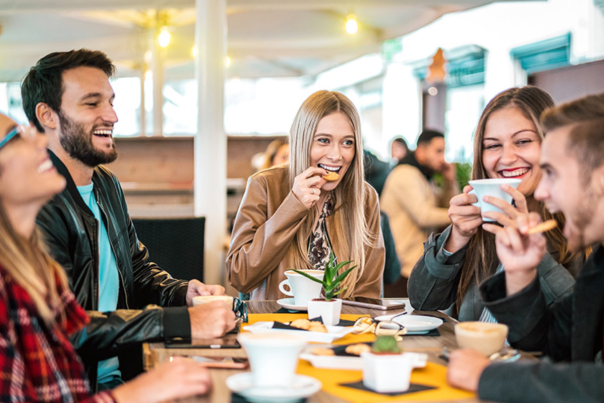 Friends enjoying good food and conversation in Ocean City, MD