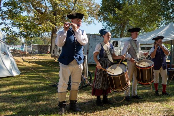 Camp Flintlock colonial band plays at the Four Oaks Acorn Festival.