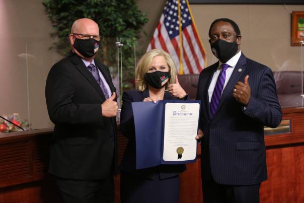 Global Meetings Industry Day (GMID) proclamation pictured with (left to right) Mark Tester, Executive Director, Orange County Convention Center, Casandra Matej, President & CEO, Visit Orlando and Mayor Demings