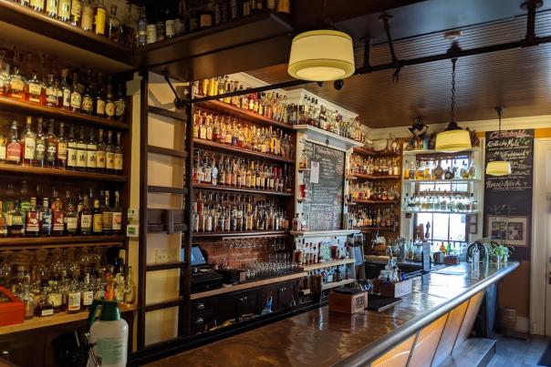 More than 700 bottles of bourbon behind the bar at Old Kentucky Bourbon Bar