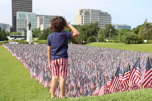 Memorial Day boy with flags