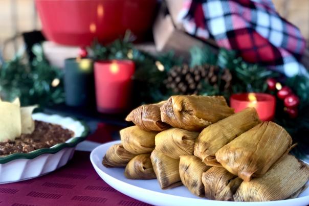 plate of pork tamales from Elmer's Tacos with holiday decor