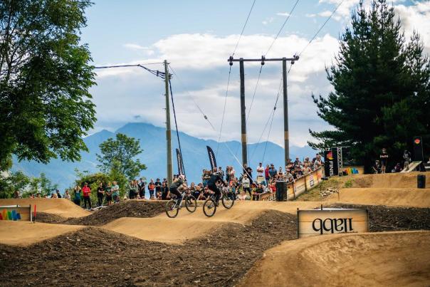 Two mountain bikers racing on the Kerry Drive Pump Track