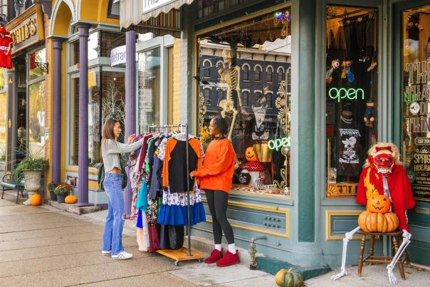 Two women shop outside of This, That and the Odder things