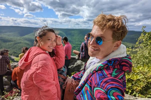Hikers enjoy a panoramic view in the Pocono Mountains.