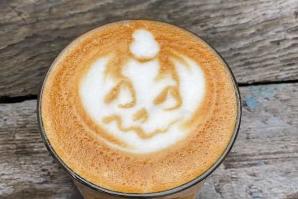 Cup of Cold Brew Coffee Latte topped with Pumpkin