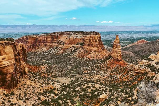 View of Colorado National Monument with Book Cliffs in the Background