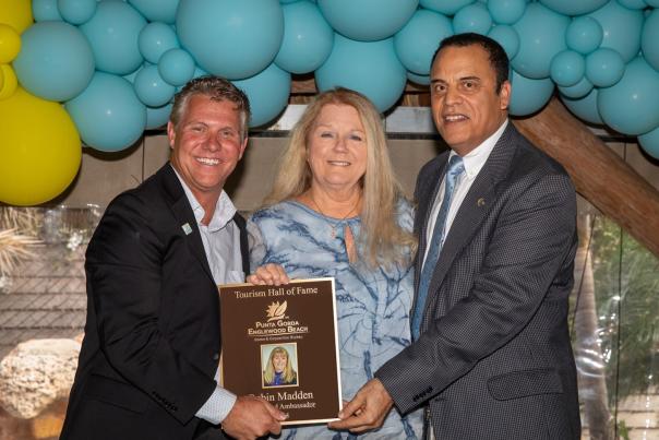 Robin Madden, owner of Islander Properties, receiving the Tourism Hall of Fame Award from the Punta Gorda/Englewood Beach VCB on May 9, 2025