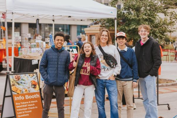 A group of five college students at Red River Market
