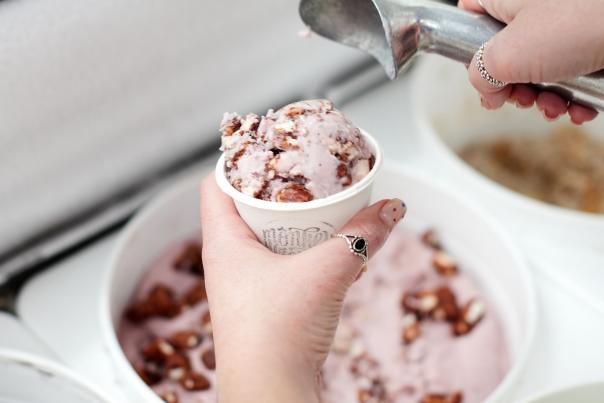 Image of a worker scooping vegan ice cream at Monkeywrench in salt lake city