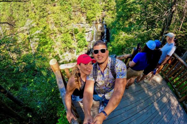 A couple enjoys the beautiful waterfalls in the Poconos