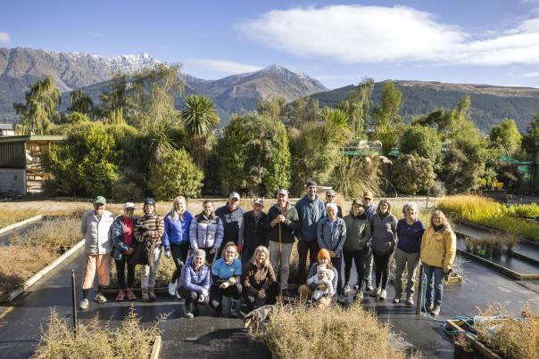 Group of Whakatipu Reforestation Trust Volunteers in standing in the nursery
