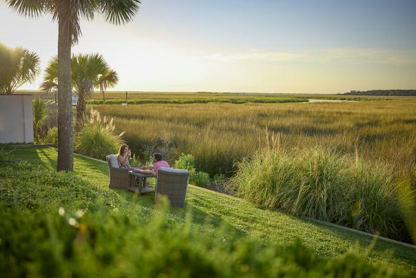 Couple sitting at the marsh