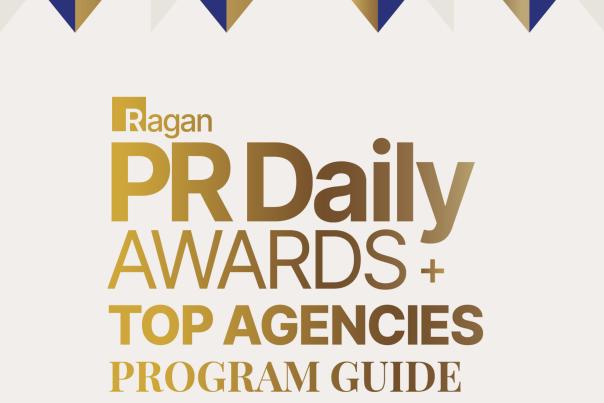 A cream-colored page with a royal blue and gold geometric pattern along the top and bottom boarders. Gold text in the center reads, "Ragan PR Daily AWARDS + TOP AGENCIES PROGRAM GUIDE." Below this, small royal blue text says, "December 11, 2024 | City Winery | NYC