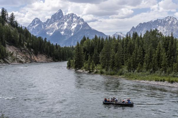 Barker Ewing Float in front of Tetons
