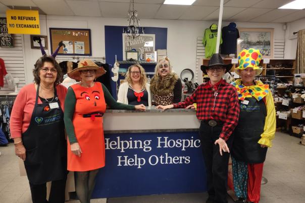 The staff of the Nanaimo Hospice Shoppe in fun clothing posing for the photo.