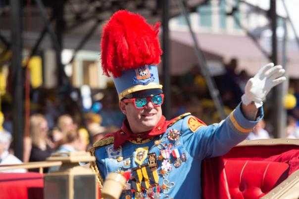 Man in Texas Cavaliers Uniform waving to crowd