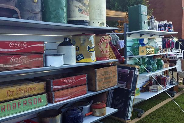 301 Endless Yard Sale antique crates and jugs in Selma, NC.