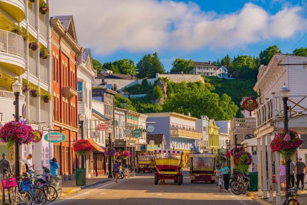 Fort Mackinac looms on the bluff above downtown Mackinac Island’s historic Main Street