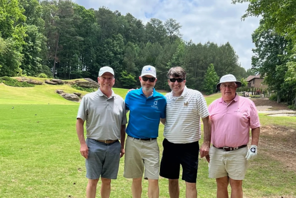 Dunwoody Rotary Golf Tournament Men Posing for Picture
