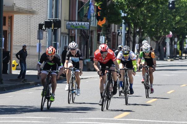 Cyclists ride down Main Street