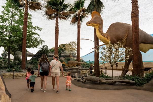 Family strolls through the Sternberg Museum in Hays