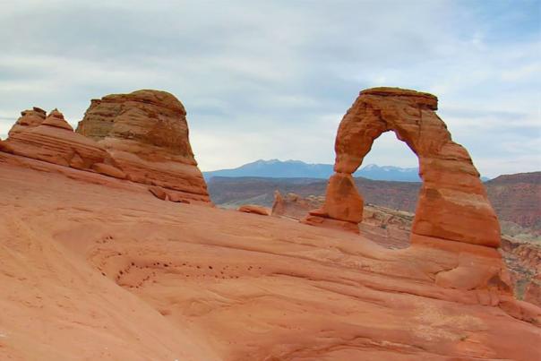 Hikers at Delicate Arch