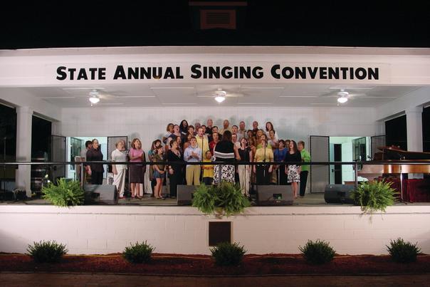A large group of singers on stage at the Benson Sing Competition held annually in Benson, NC.