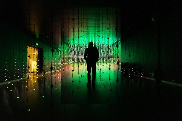 Silhouette of a person inside art installation