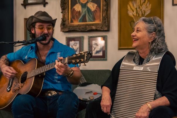Guitarist and washboard player at Haven Coffee and Cocktails