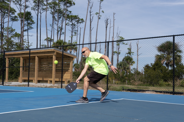 man hitting pickleball at salinas park bayside pickleball court