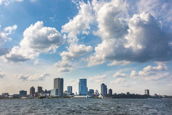 Milwaukee’s downtown skyline rises in the distance as seen from a sailboat on Lake Michigan.