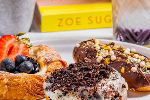 Donuts with chocolate spread and cookie crumbles